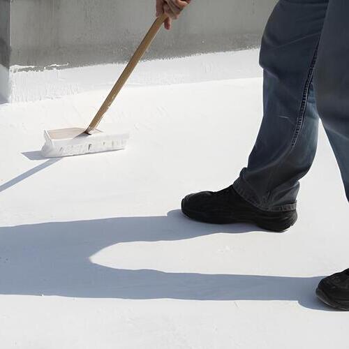 workers applying a coating